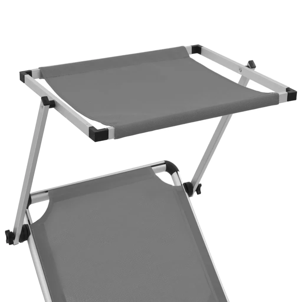 Transat aluminium pliable gris avec pare-soleil : La solution confort UV