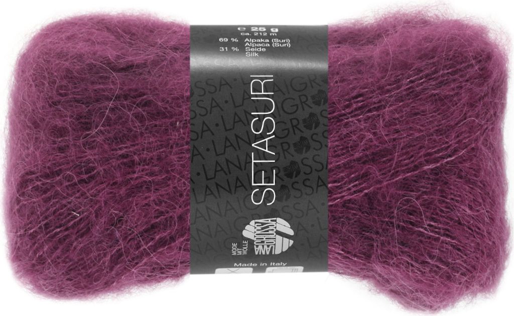 A ball of yarn with a label wrapped around it.