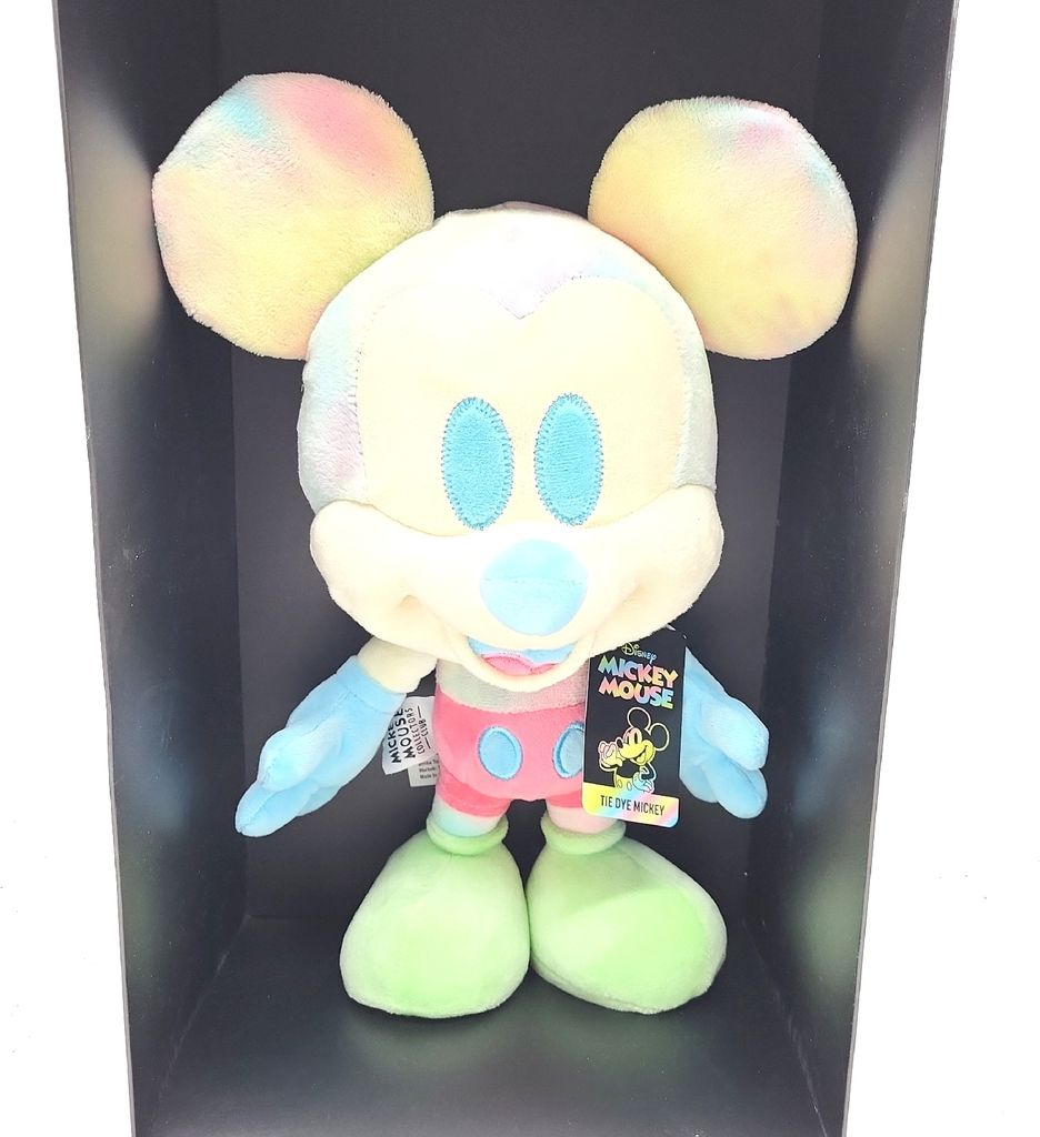 A tie-dye Mickey Mouse plush toy is displayed in a black box.