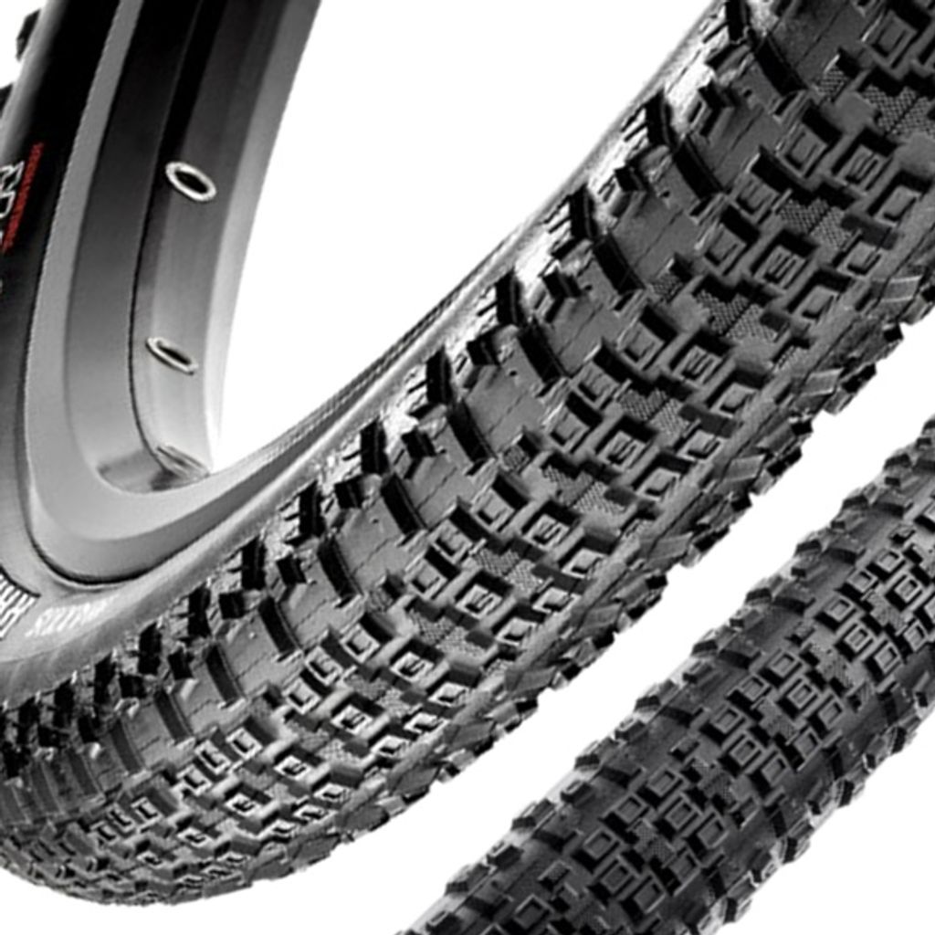 Close-up view of a bicycle tire with a detailed tread pattern.