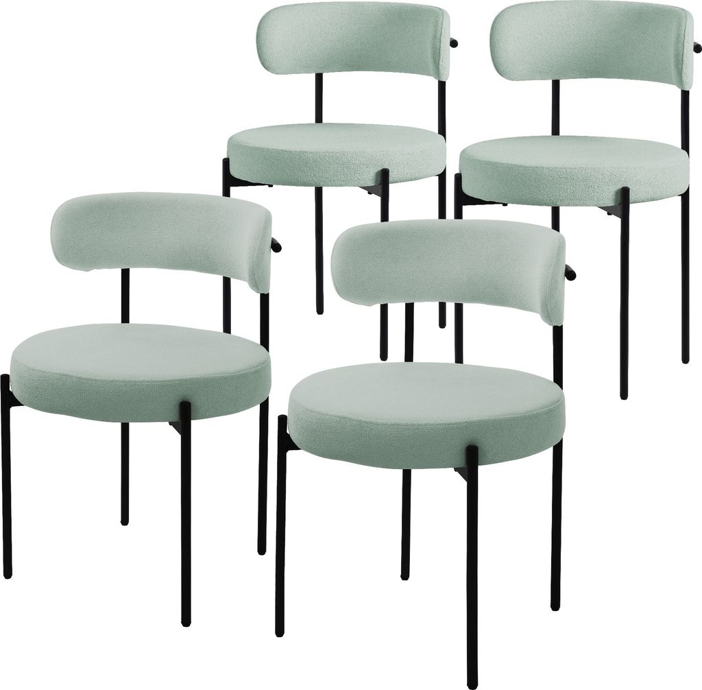 Four green upholstered chairs with black metal legs are arranged in a staggered formation against a white background.