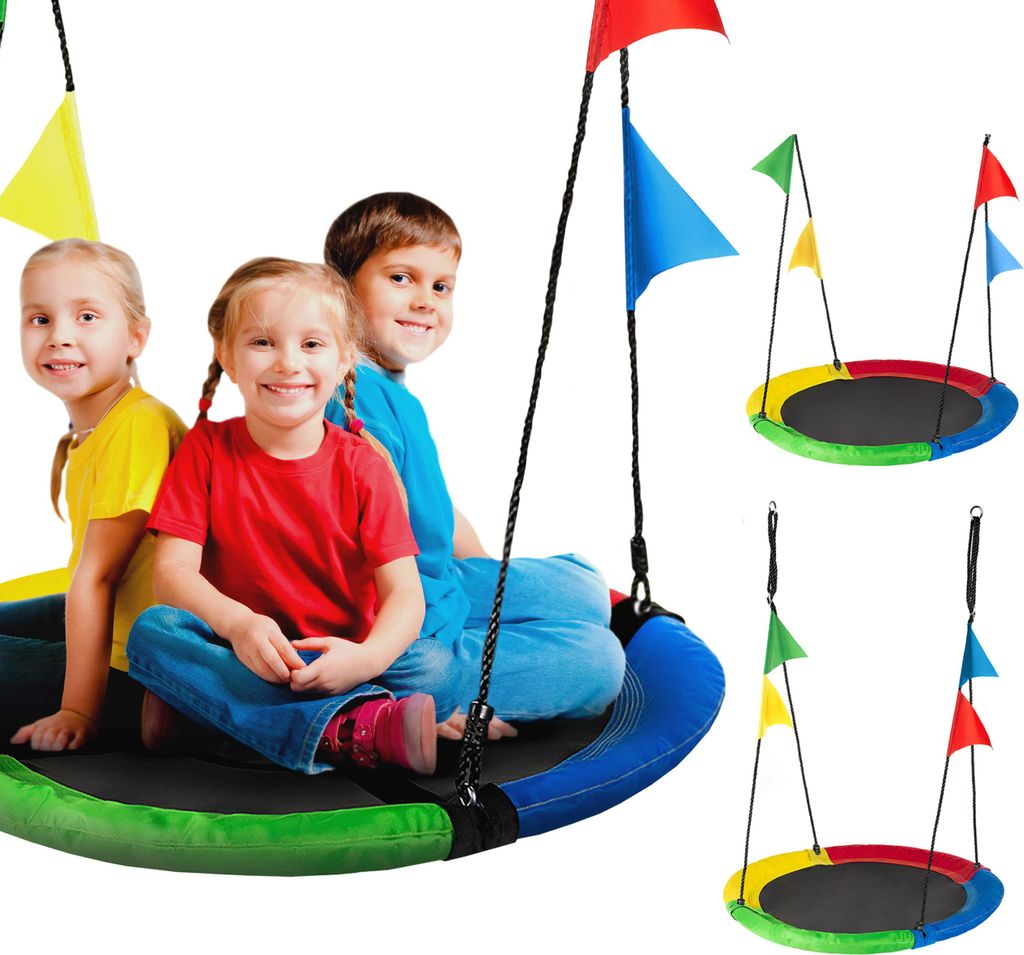 Three children sitting on a colorful nest swing with flags.