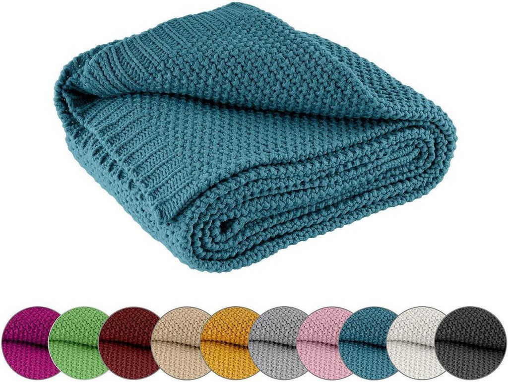 A folded teal knitted blanket is shown on a white background, with a row of colored swatches below.
