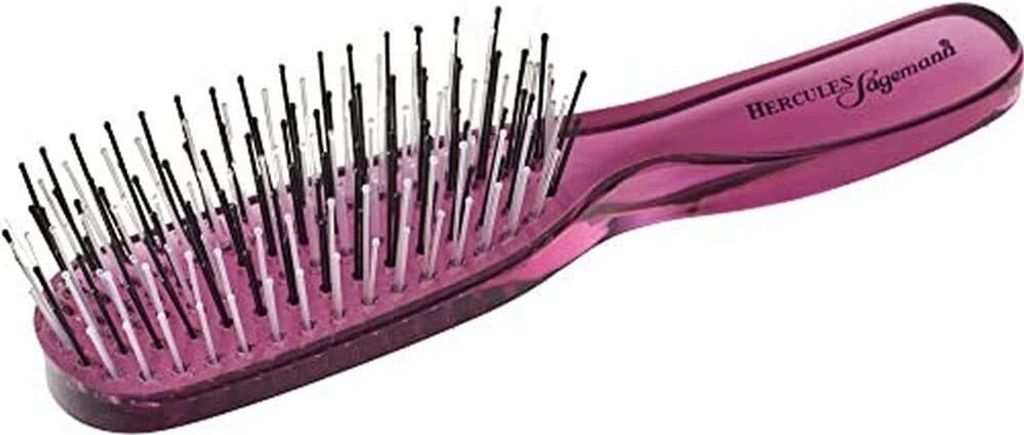 A purple hairbrush with black and silver bristles is shown against a white background.