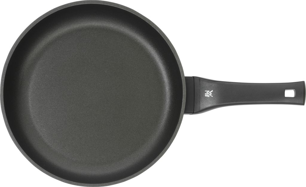A top-down view of a black frying pan with a black handle against a white background.