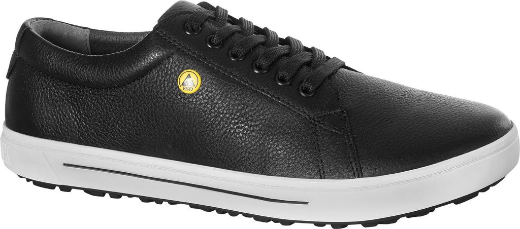 A black leather shoe with a white sole is shown from the side against a white background.