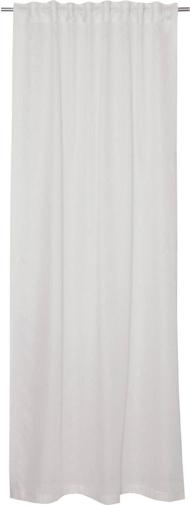 A white curtain hanging from a rod.