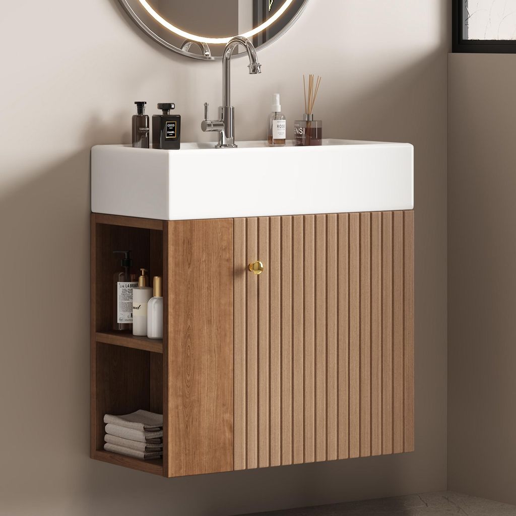 A bathroom vanity with a sink and cabinet.