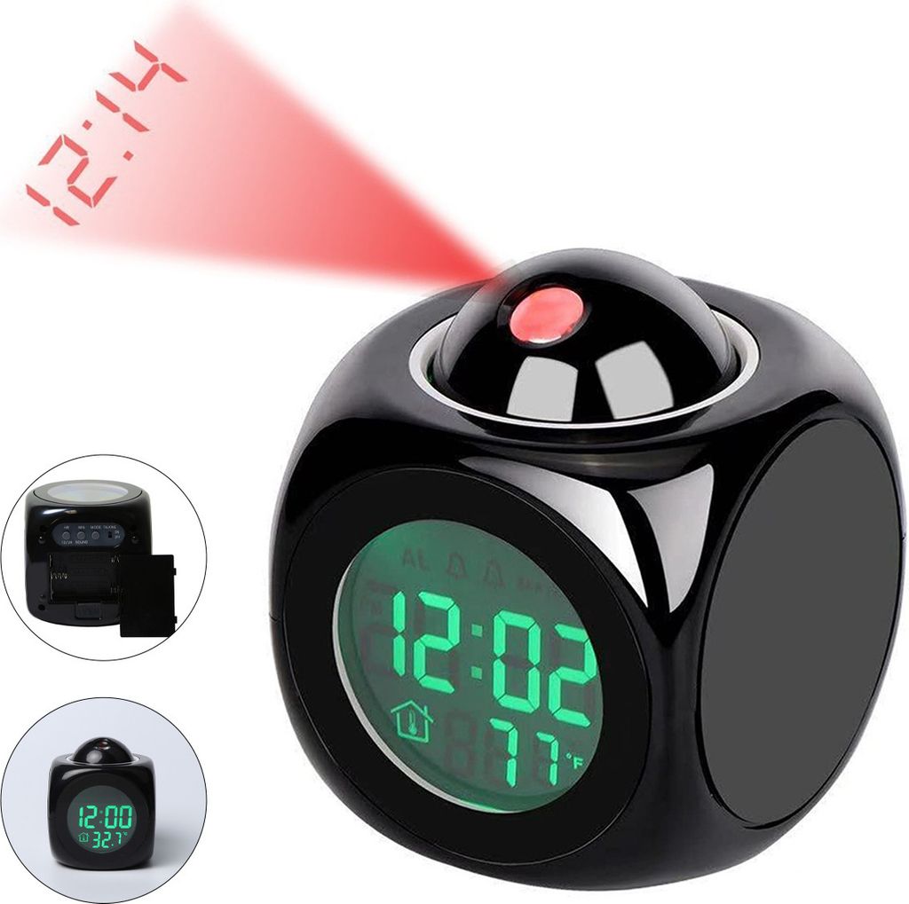 A black cube-shaped digital alarm clock with a projection feature displaying the time on a red beam.