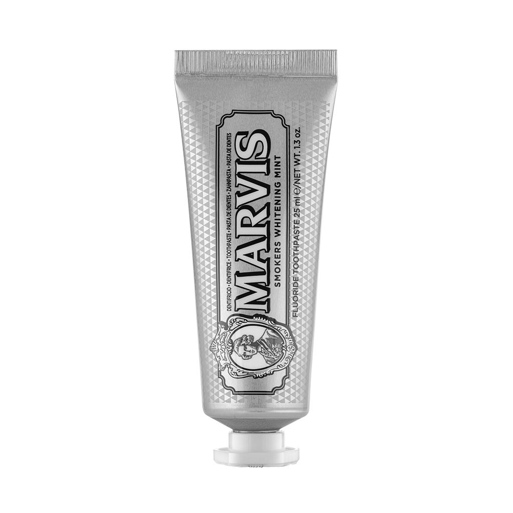 A Marvis Smokers Whitening Mint toothpaste tube against a white background.