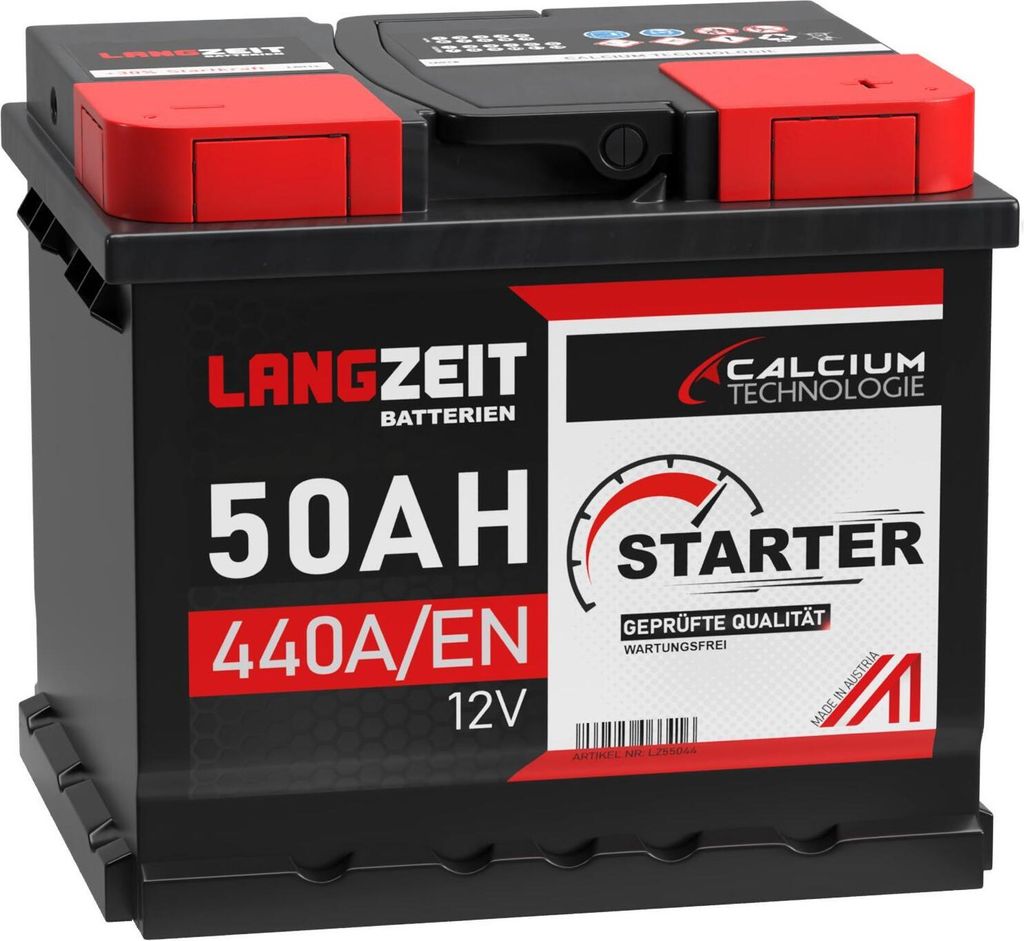 A black car battery with red and white labeling.