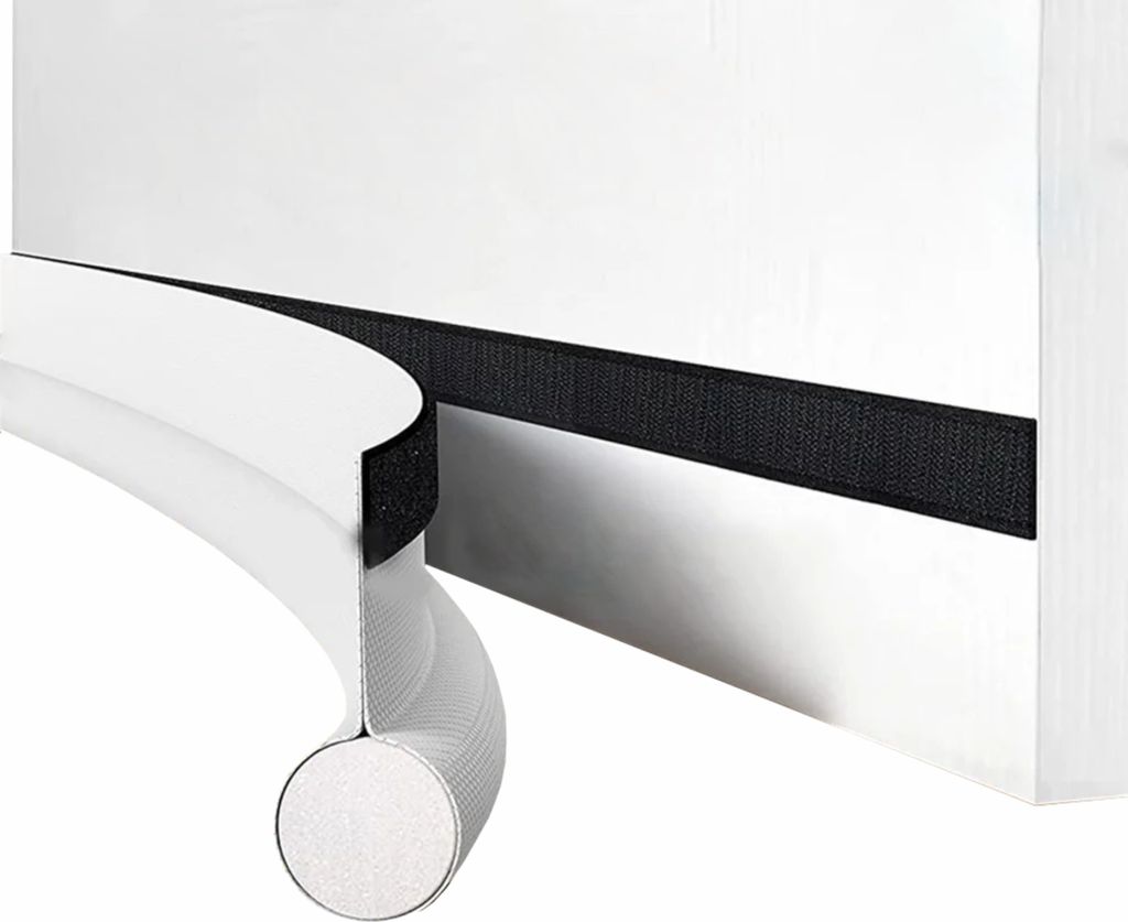 A close-up view of a white door seal with a black velcro strip attached to the door.