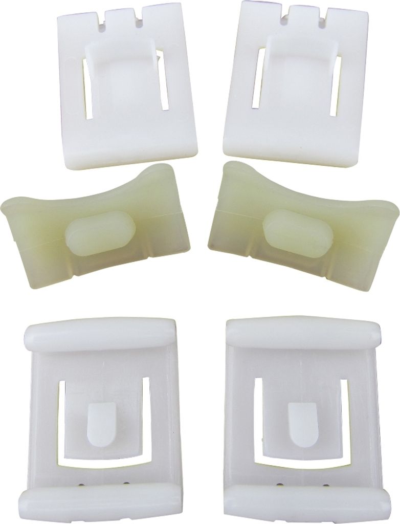 A product shot of several plastic car parts against a white background.