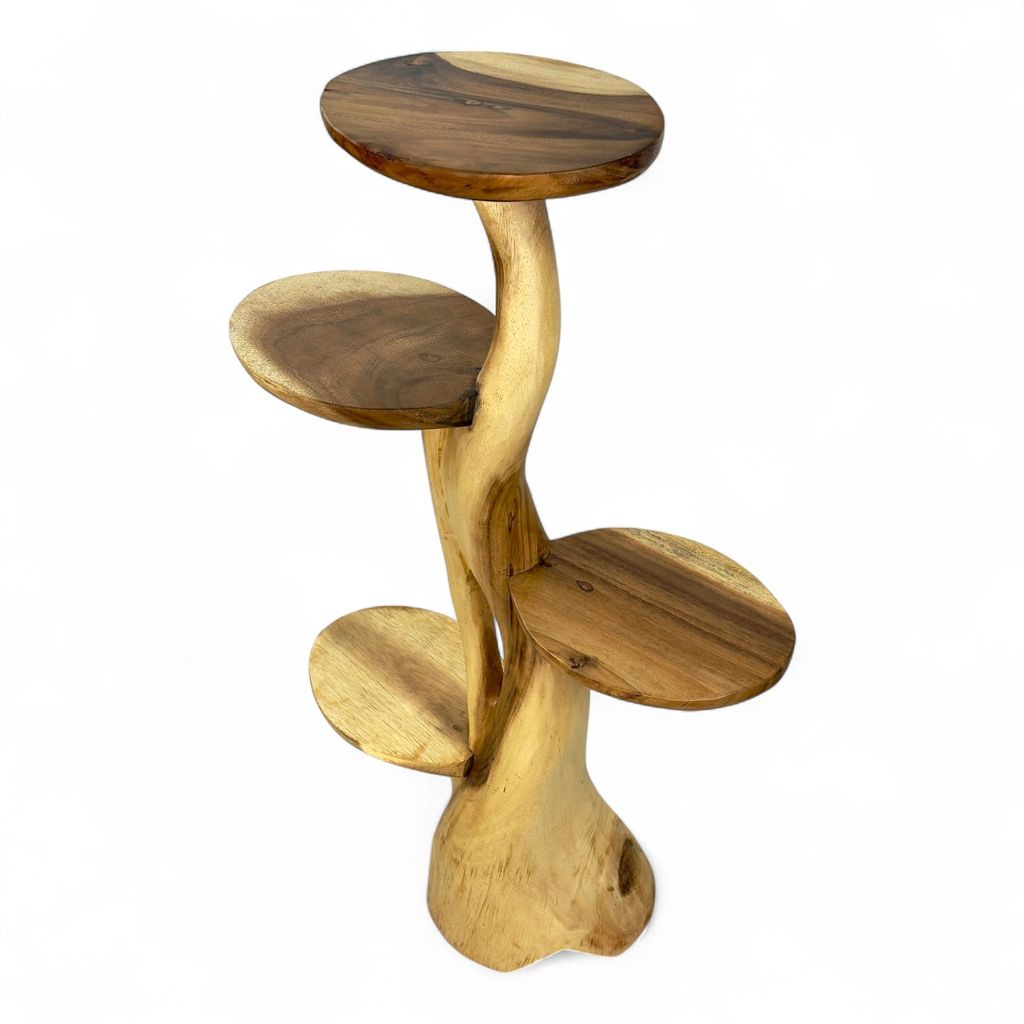A multi-tiered wooden shelf with a natural, organic design.