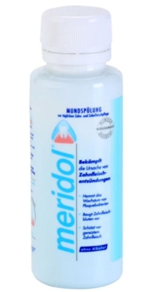 A bottle of Meridol mouthwash on a white background.