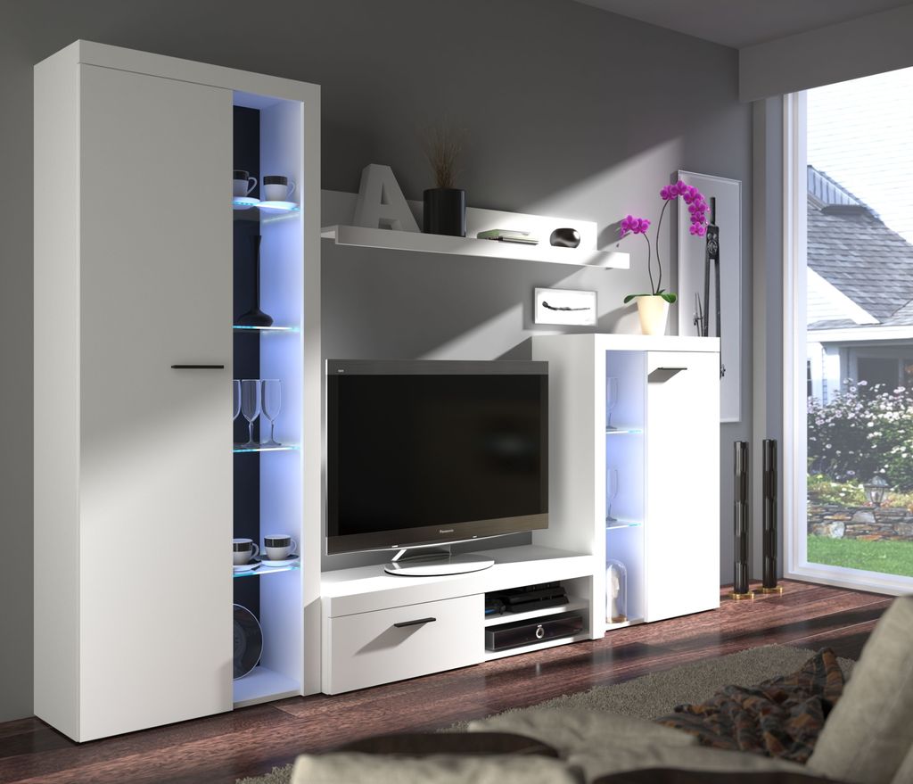 A modern white living room furniture set with a TV, shelves, and cabinets, illuminated by blue LED lights.