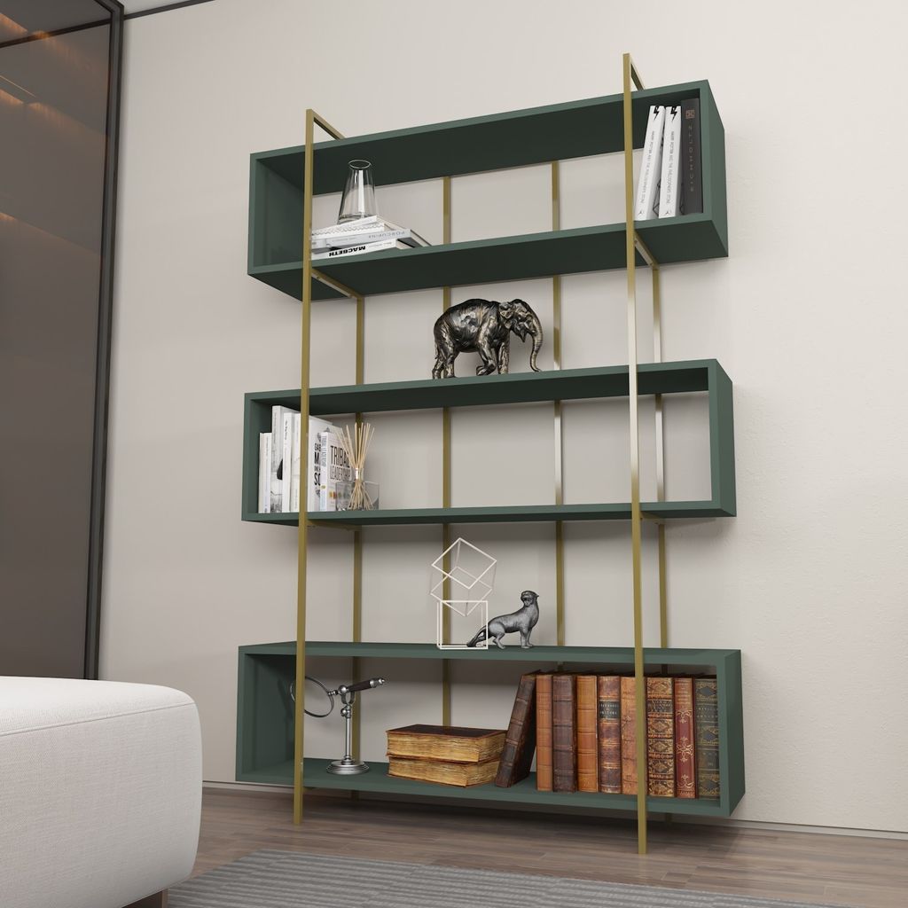 A modern, dark green bookshelf with gold accents, filled with books and decorative items, placed against a light gray wall.