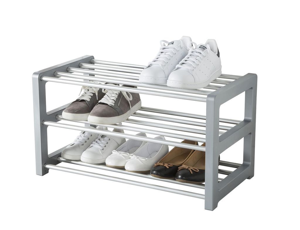 A three-tier shoe rack filled with various shoes, presented against a white background.