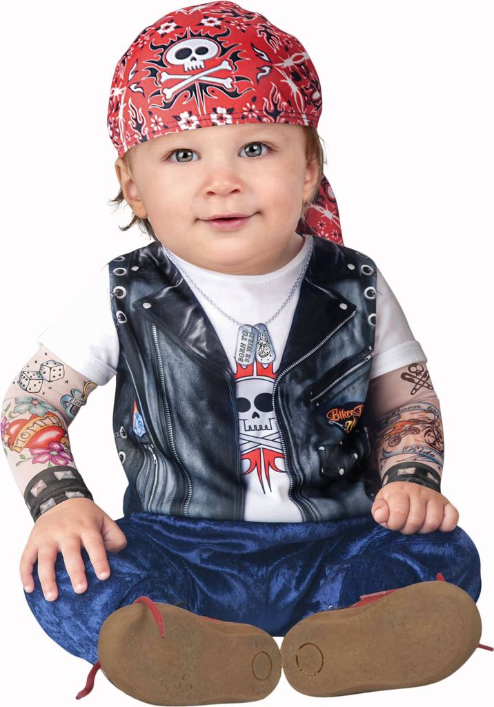 A baby wearing a biker costume.