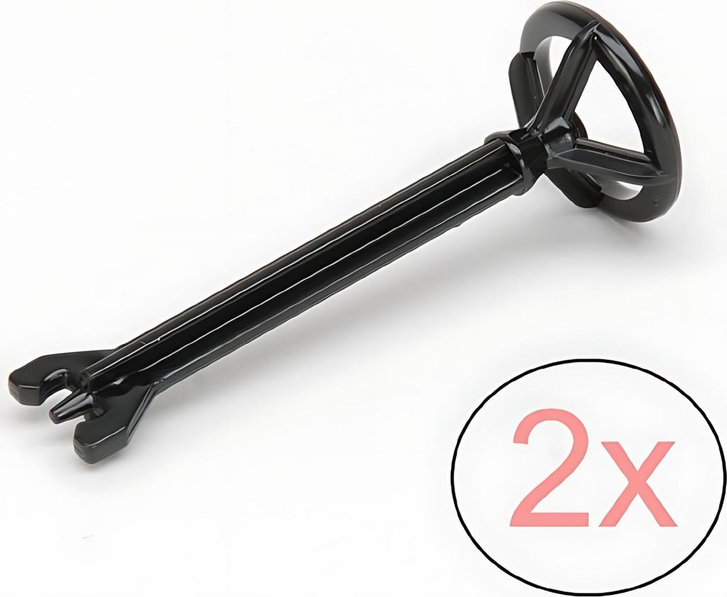A black plastic steering wheel accessory for a toy vehicle, shown against a white background.
