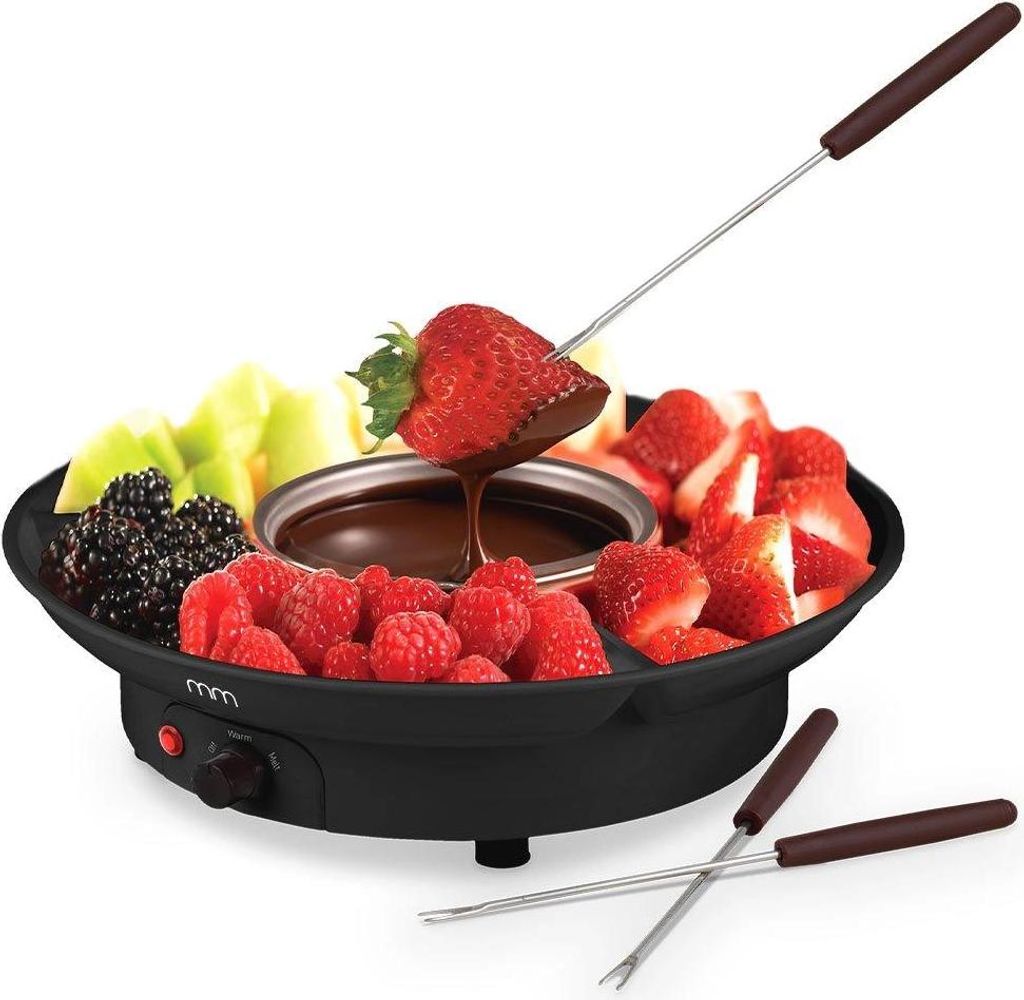 A chocolate fondue set with various fruits.