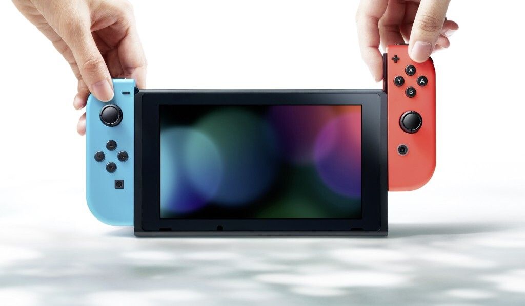 Nintendo Switch, couleur : rouge fluo/bleu fluo, mémoire :
