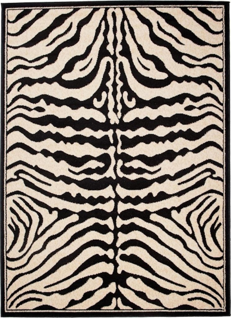 A close-up view of a rug with a zebra pattern.