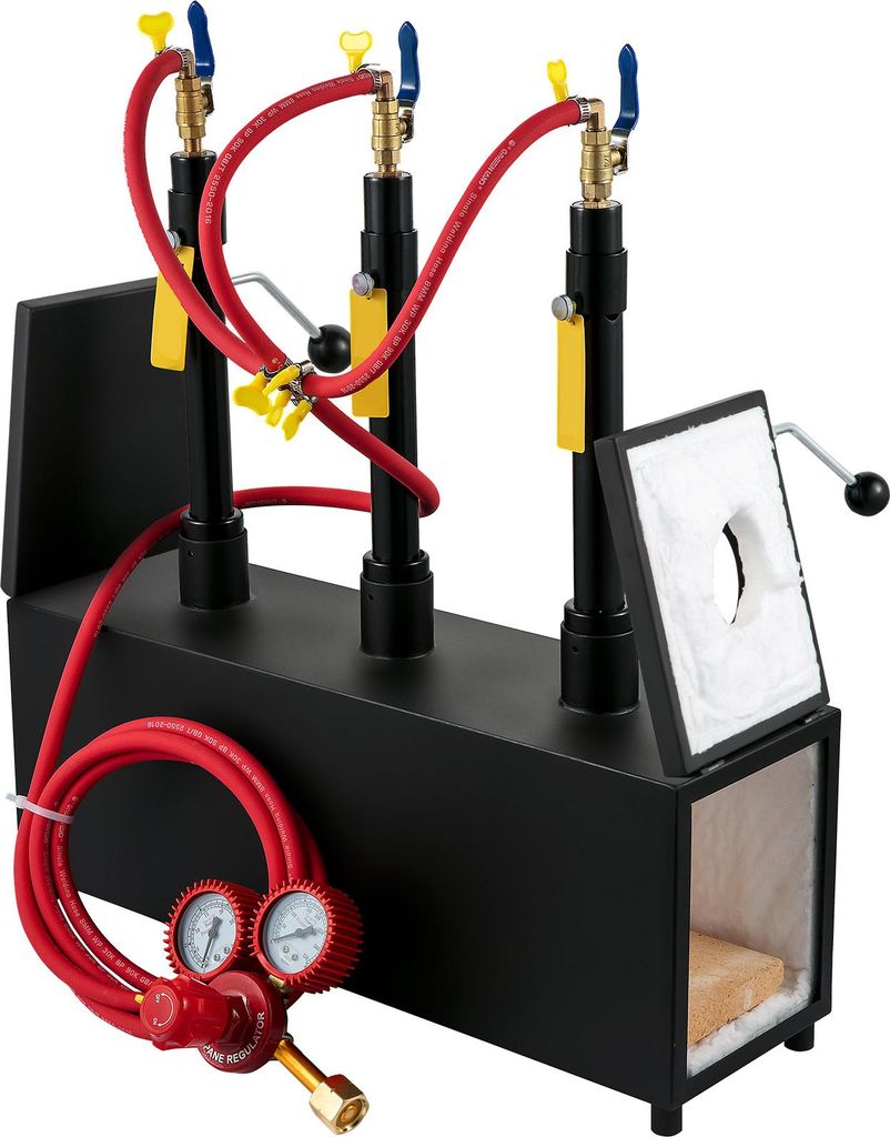 A three-burner gas forge with attached hoses and a regulator.