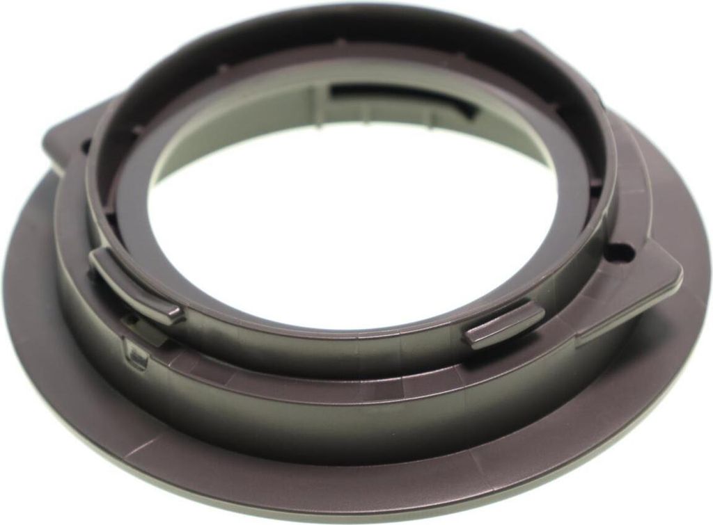 A close-up studio shot of a brown plastic part for a blender.