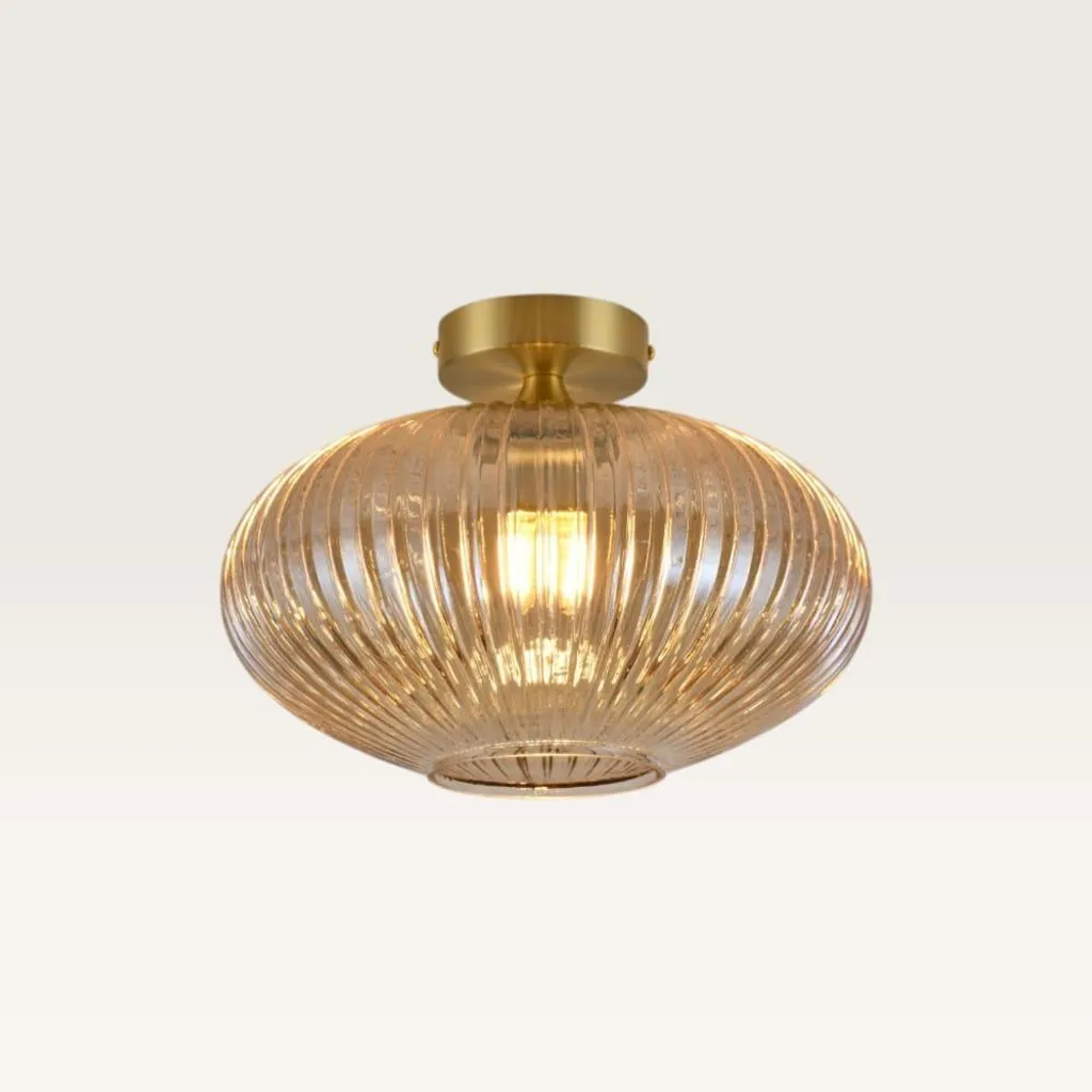 Plafonnier design ovale verre ambré doré LUSENZ : fini l'ombre !