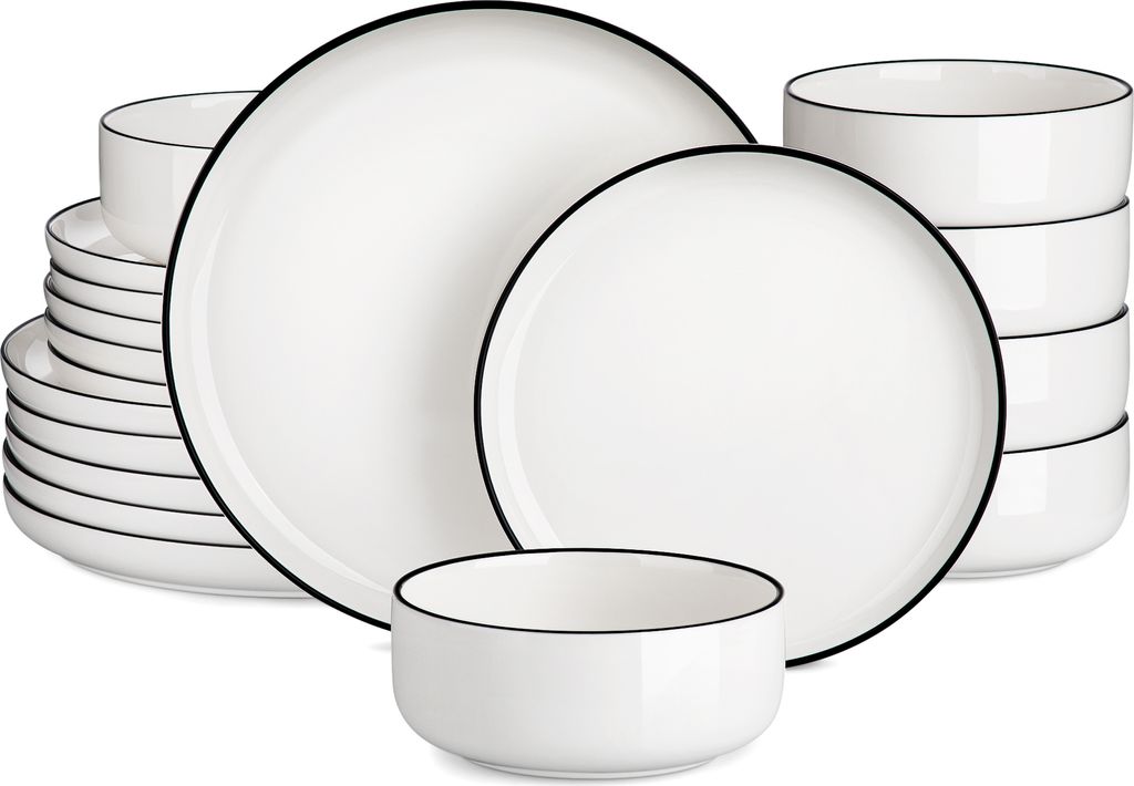 A set of white ceramic dishes with a thin black rim.