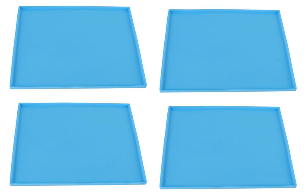 Four blue silicone mats arranged in a 2x2 grid on a white background.