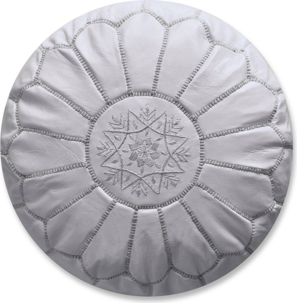 A white leather pouf with decorative stitching and a central star pattern.
