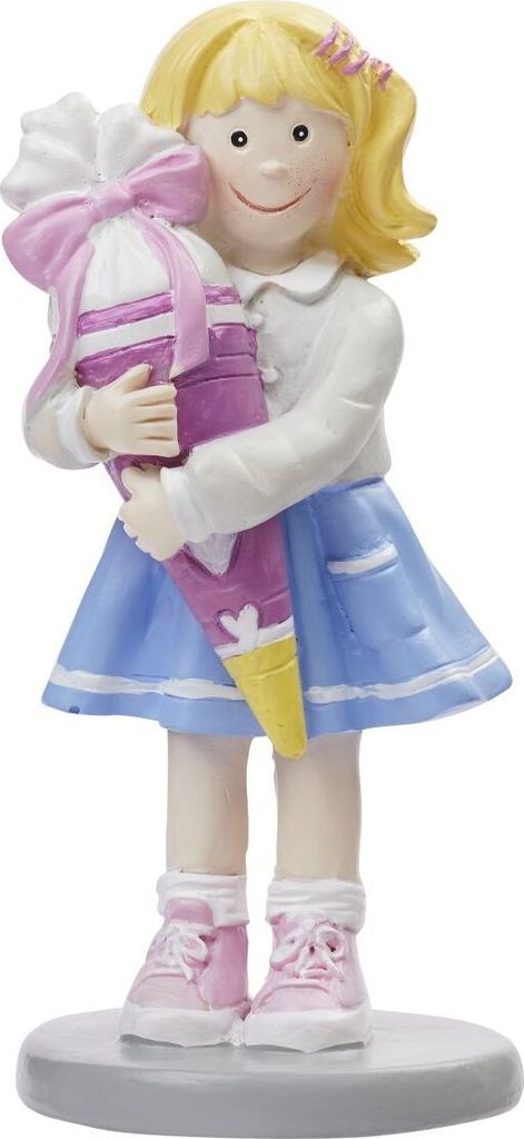 A figurine of a young girl holding a school cone.