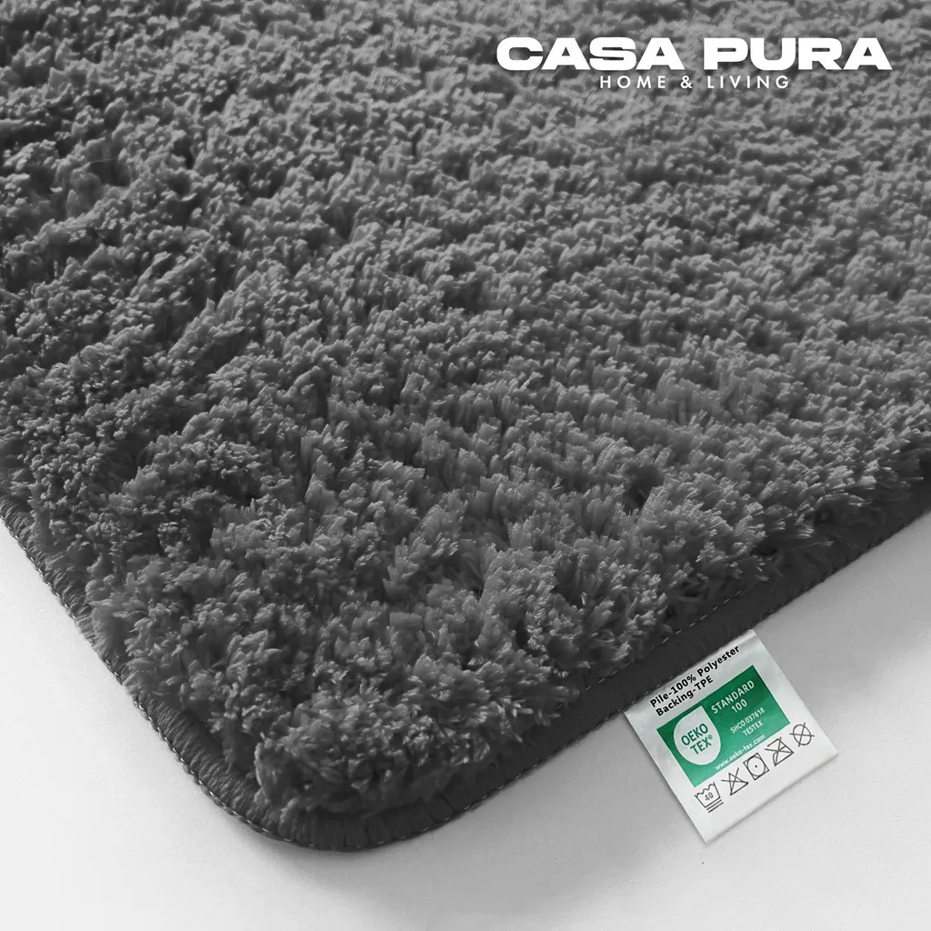 Tapis de douche rond gris foncé pour sortie de bain confortable et sec