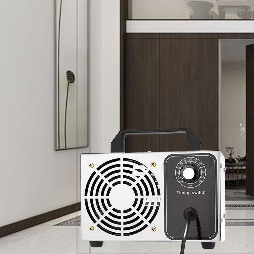 An ozone generator is placed on a floor in a hallway.