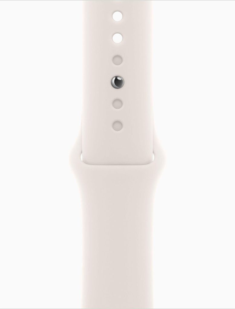 A close-up view of a white watch band with a silver pin.