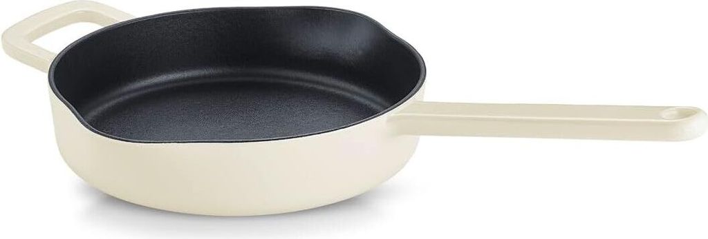 A cream-colored enameled cast iron frying pan with a black interior and a long handle is shown against a white background.