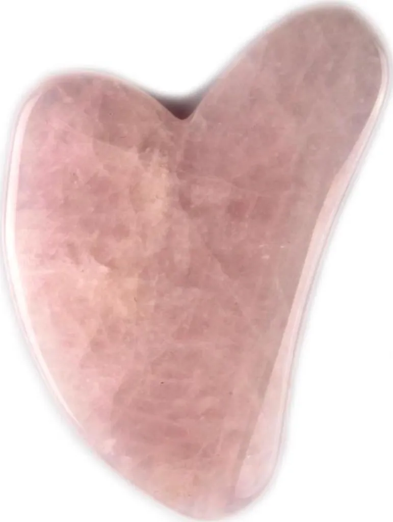 Massage drainant du visage avec le Gua Sha quartz rose authentique