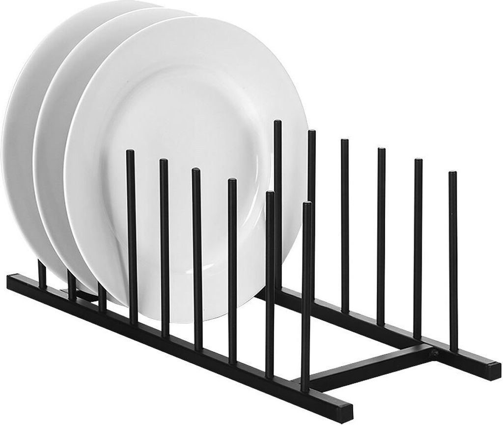 A plate rack holding three white plates.