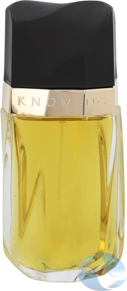 A perfume bottle with yellow liquid inside and a black cap.