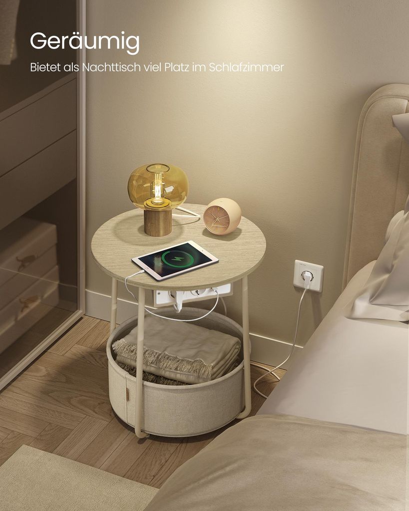 A bedside table with a lamp, tablet, and storage basket in a bedroom setting.