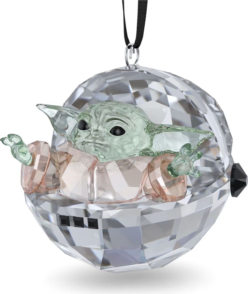 A decorative ornament of Grogu (Baby Yoda) from Star Wars, encased in a faceted crystal sphere.
