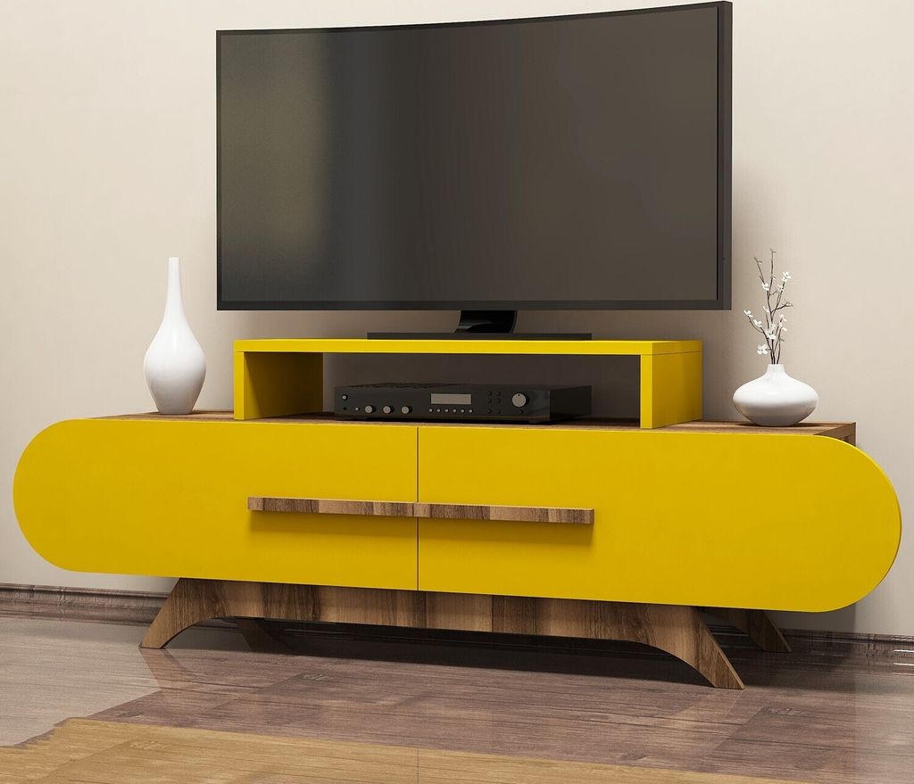 A modern yellow TV stand with a television on top, and decorative vases on either side.
