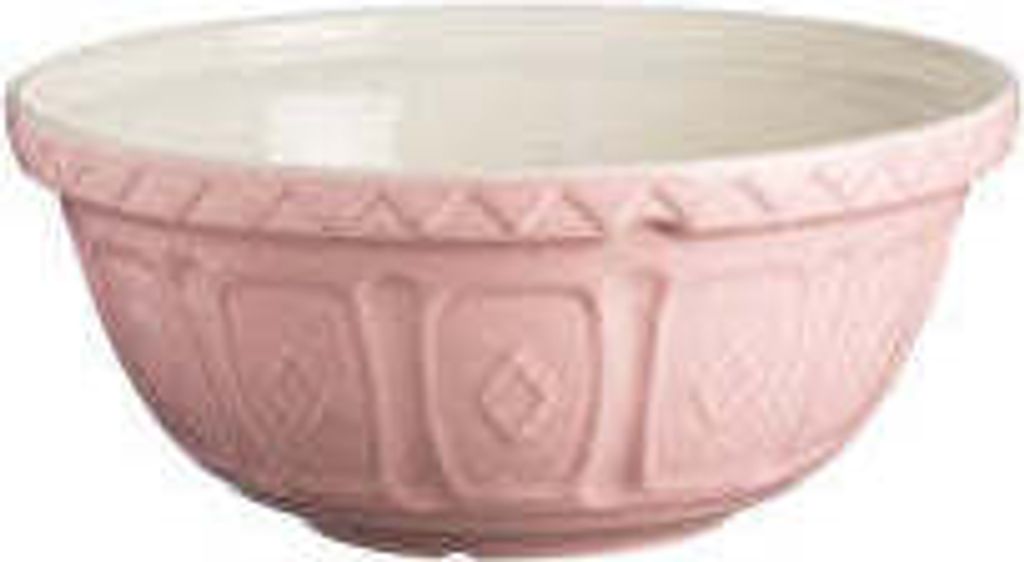 A pink ceramic mixing bowl with a textured exterior and a white interior, shown from a slightly elevated side angle.