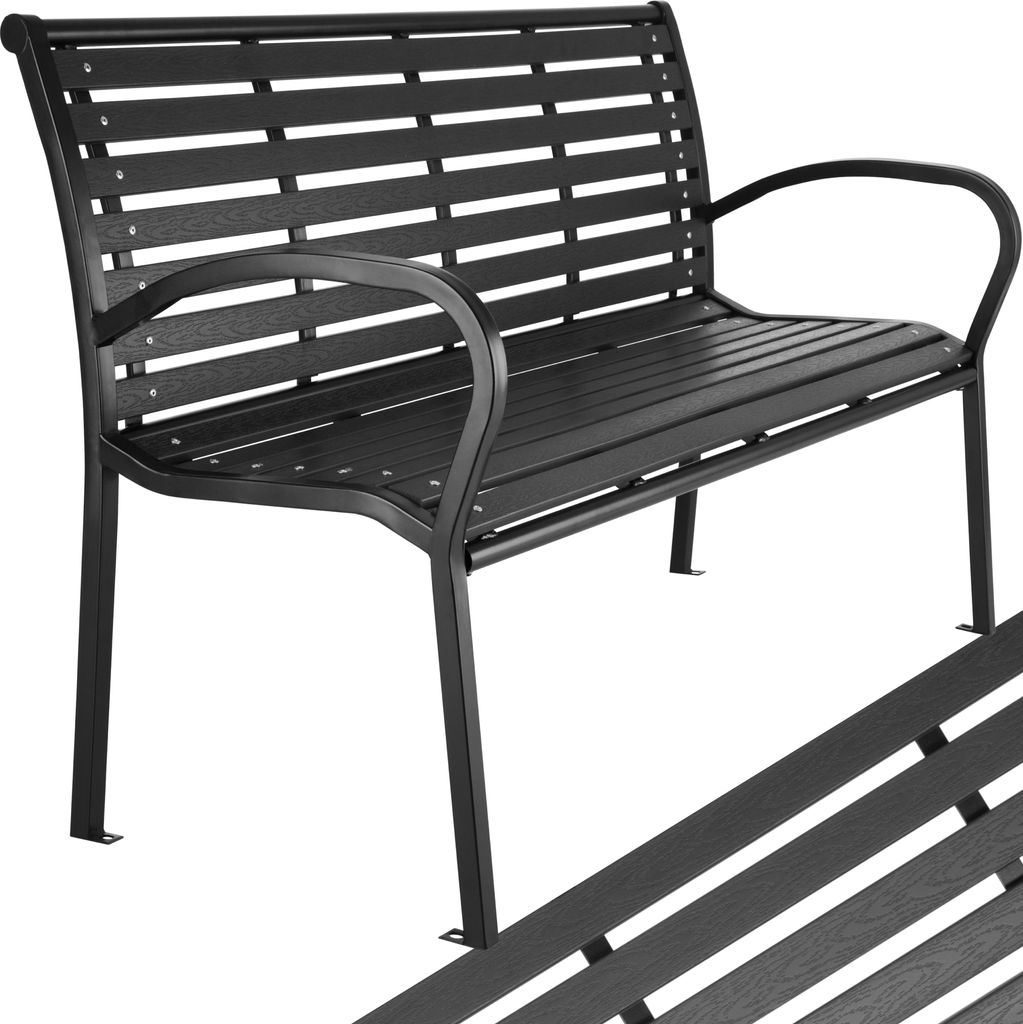 A black metal garden bench with a slatted seat and backrest, shown from a slightly elevated side angle against a white background. A portion of another bench is visible in the foreground, angled diagonally.