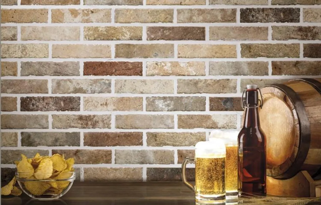 Carreau mural mat 6x25 aspect brique avec mélange de nuances naturelles