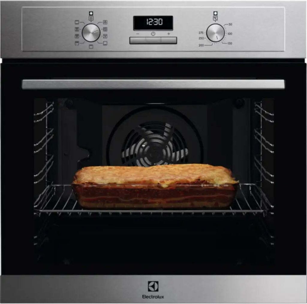 An Electrolux oven with a dish of lasagna inside.