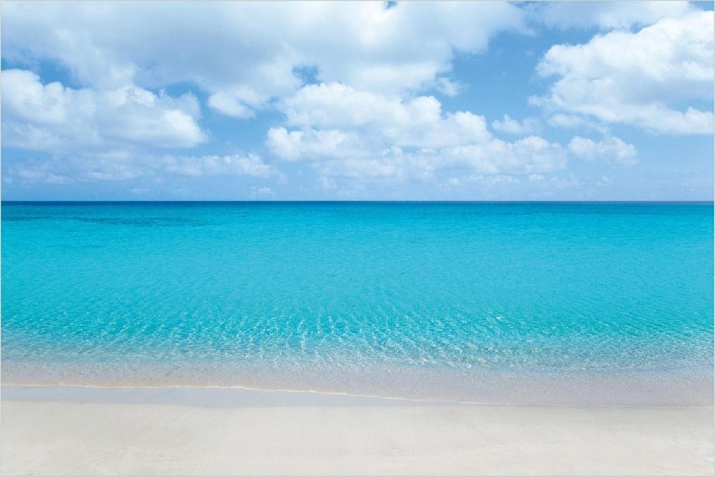 Wallario Poster - Sandstrand und blaues Meer, Kunstdruck Größe: 100 x 150 cm