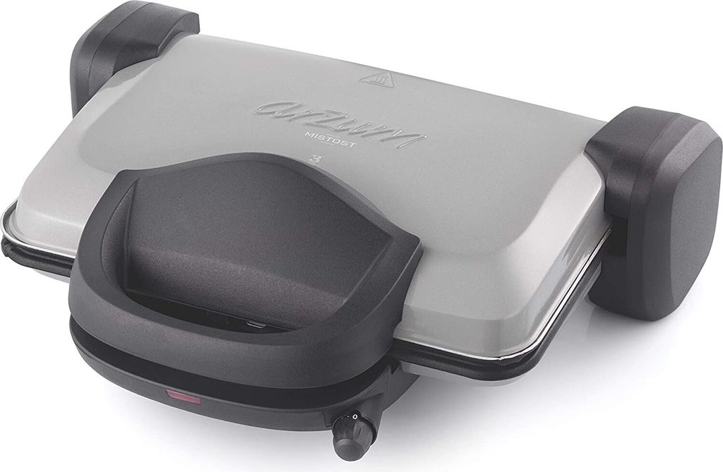 A close-up, angled view of a closed grill and sandwich maker on a white background.